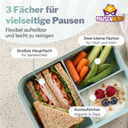 Grüne geöffnete Brotdose mit Brot, Möhren, Gurken und Dip