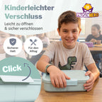 Junge im Klassenzimmer, leichter Verschluss der Brotdose