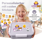 Mädchen mit grauer Brotdose mit Tier und Namensticker
